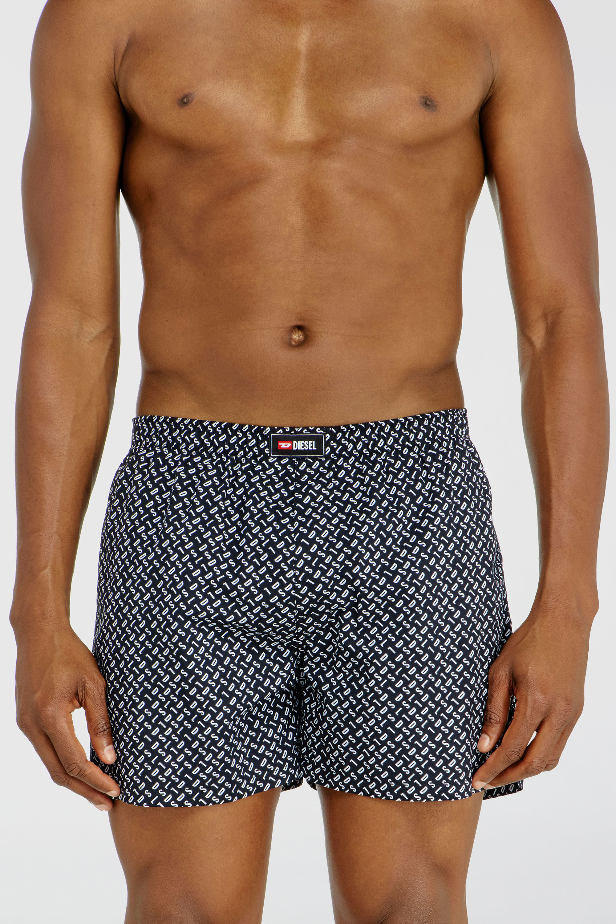 Diesel - RYAN-D-CORE-3PACK, Herren Boxershorts aus Baumwolle mit unifarbenem und all-over DSL-Print im Dreierpack in Blau - 3