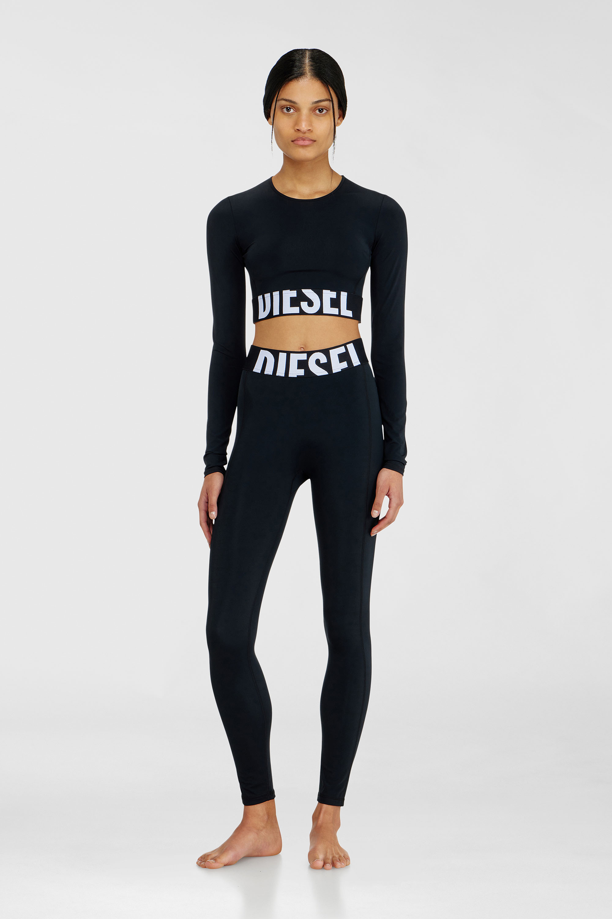Diesel - ADELINE-D-POP, Damen Leggings aus Mikrofaser mit Cut-off-Logo in Schwarz - 1