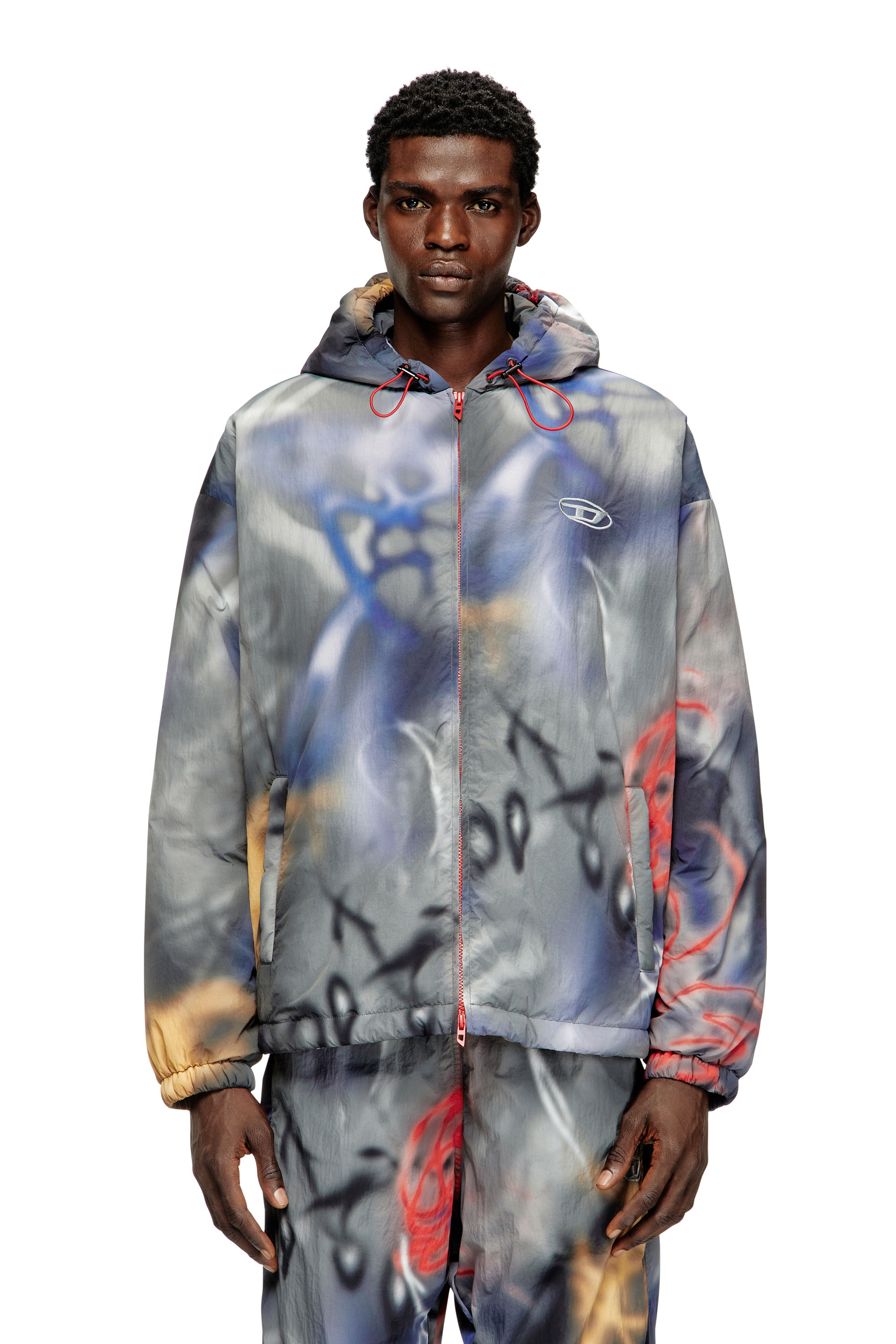 Diesel - J-MIRR, Herren Padded windbreaker with graffiti print in Blau/Grau - 1