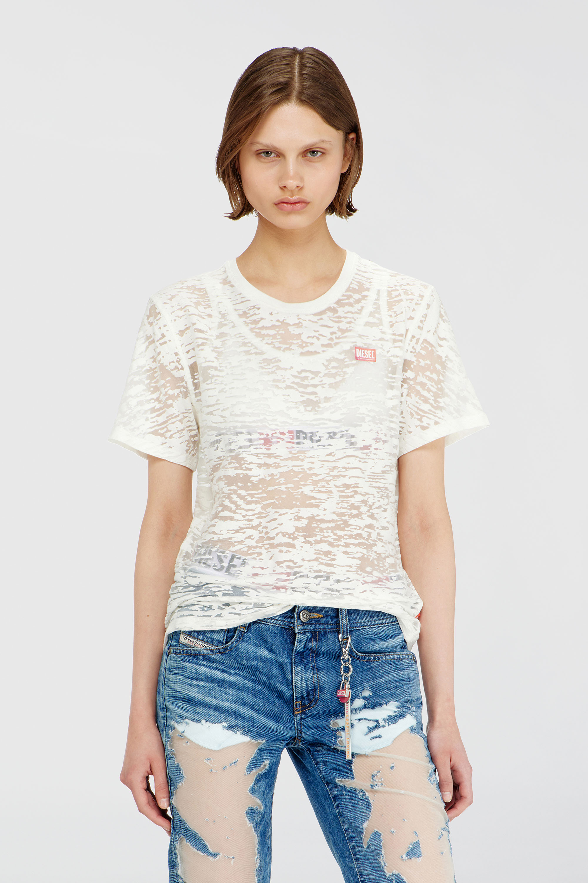 Diesel - PR-T-NOTS-MATI-R, Unisex T-shirt aus all-over devor&eacute;-Jersey in Wei&szlig; - 1