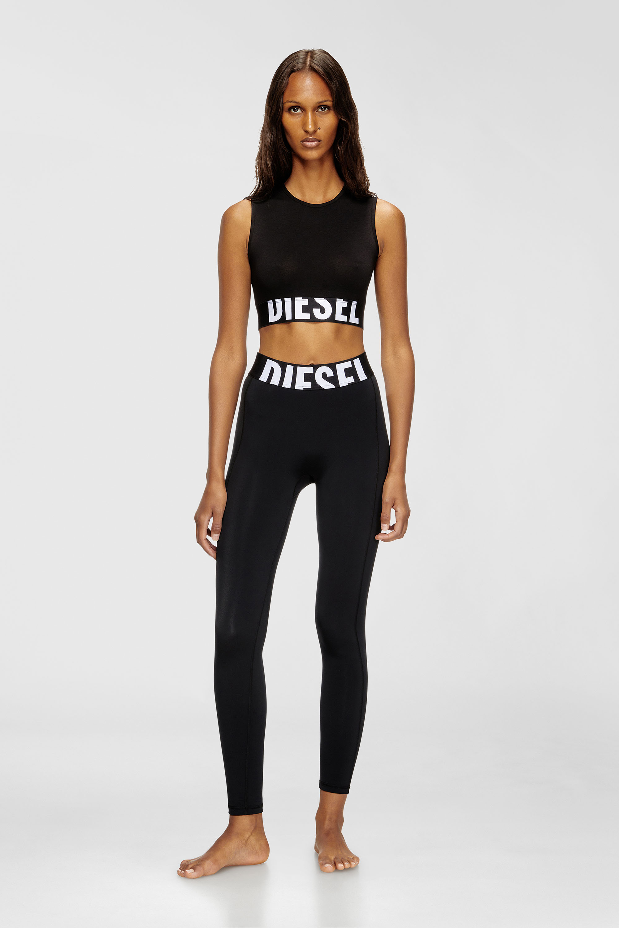 Diesel - ADA-D-POP, Damen Verk&uuml;rztes Tanktop mit Cut-off-Logo in Schwarz - 1